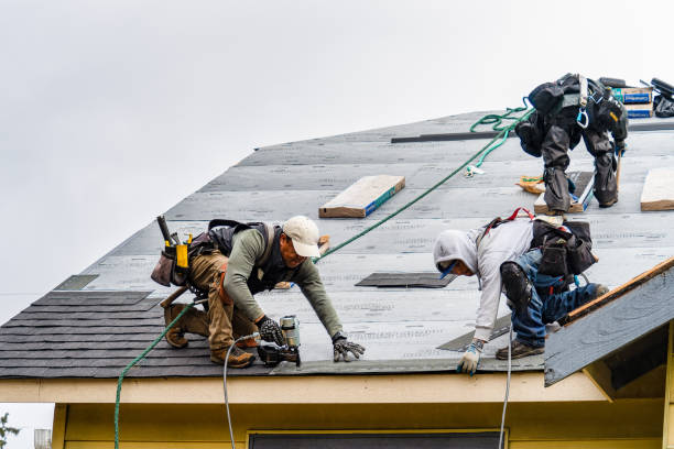 Professional Gutter Installation technician working in Prides Crossing, MA